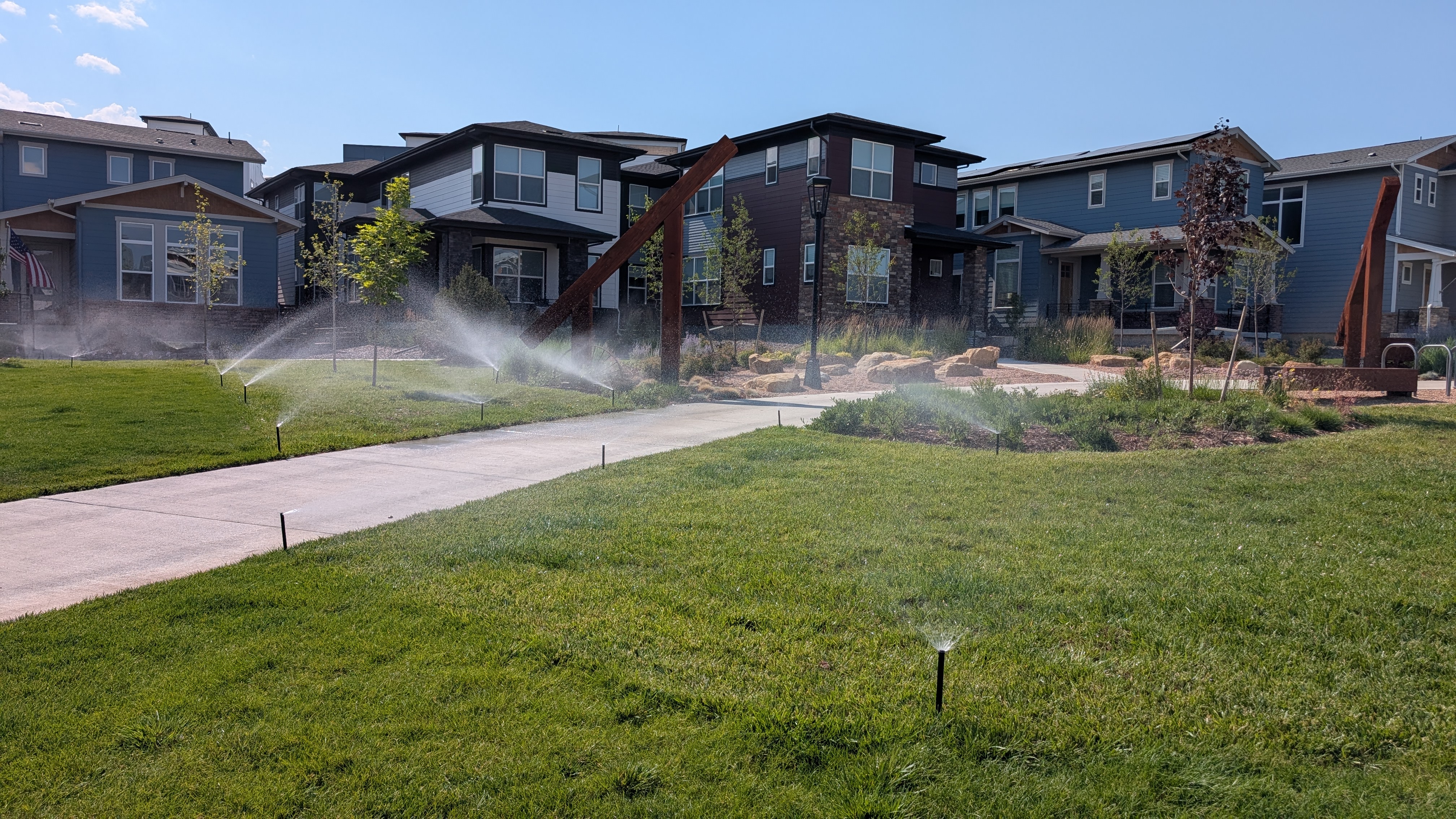 Spinklers are pretty good here (still couldn't walk on sidewalk). BUT - it's 90 degrees outside and it's 4pm in the afternoon. Hello evaporation.