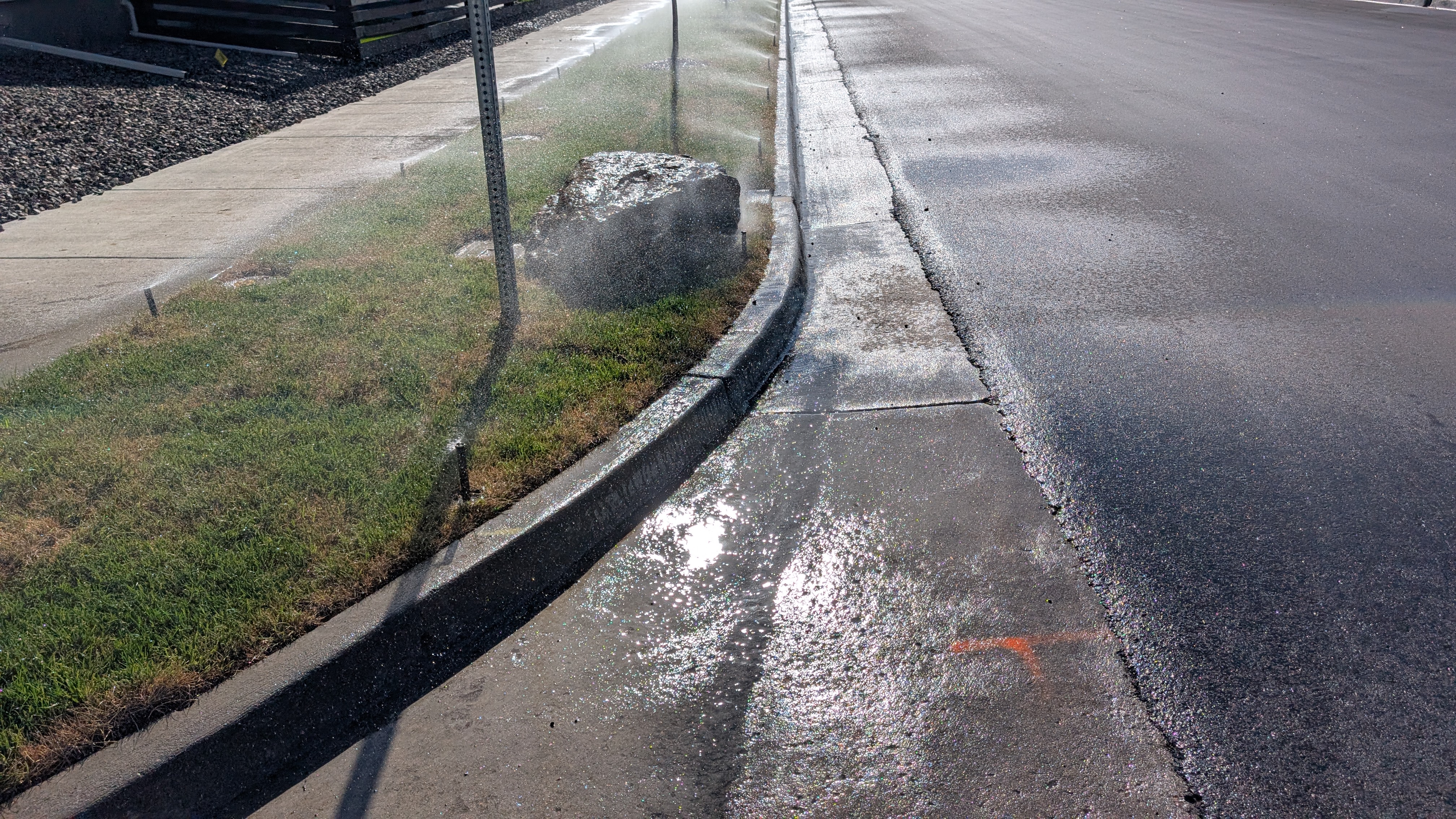 On the face of it, the sprinklers are well controlled. But look at how much gets on the road (and any cars that would be parked). Waste of water, ruined paint.